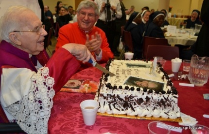 Enjoying cutting cake with Cardinal Colins